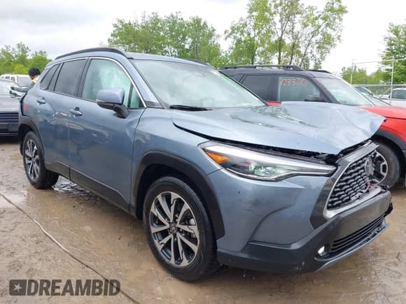 ✅ 2023 Toyota Corolla Cross XLE • VIN: 7MUDAAAG4PV062515 • Lot: 42323389. Listed on IAAI with 30,092 mi. Free auction sales archive from the USA and detailed vehicle history report at DreamBid. Image 1.