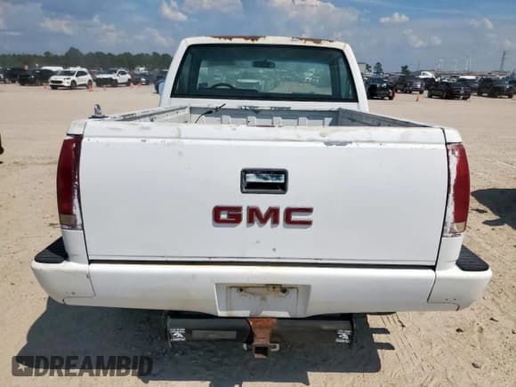 ✅ 1990 GMC Sierra 1500 • VIN: 1GTDC14Z1LZ545163 • Lot: 80943525. Wystawiony na Copart z przebiegiem 181 256 mil. Bezpłatny archiwum sprzedaży aukcyjnych z USA i szczegółowy raport historii pojazdu na DreamBid. Zdjęcie 7.