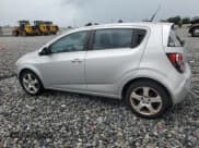 ✅ 2012 Chevrolet Sonic LTZ • VIN: 1G1JE6SH7C4123988 • Lot: 64845065. Listed on Copart with 130,139 mi. Free auction sales archive from the USA and detailed vehicle history report at DreamBid. Image 2.