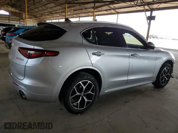 ✅ 2021 Alfa Romeo Stelvio Ti • VIN: ZASPAKBN9M7D15495 • Лот: 70220115. Опубликован ранее на Copart с пробегом 48 158 миль. Бесплатный доступ к архиву аукционных продаж из США и подробный отчёт об истории автомобиля на DreamBid. Изображение 3.