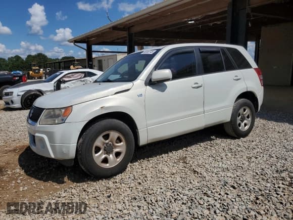 ✅ 2006 Suzuki Grand Vitara • VIN: JS3TE941864102820 • Lot: 65349745. Listed on Copart with 123,662 mi. Free auction sales archive from the USA and detailed vehicle history report at DreamBid. Image 1.