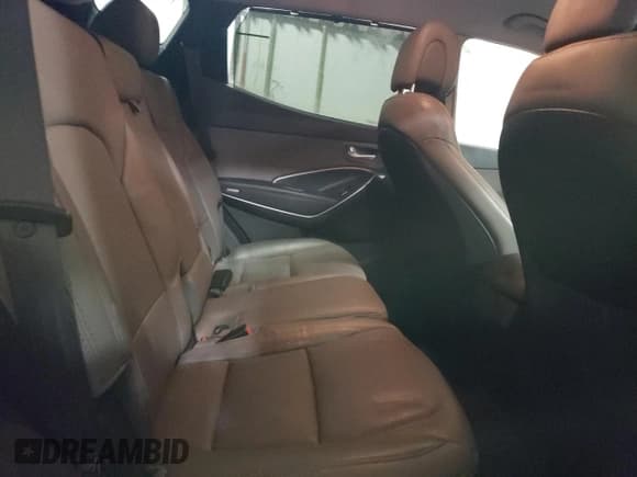 ✅ 2017 Hyundai Santa Fe 2.0T • VIN: 5XYZU4LA2HG458250 • Лот: 35917323. Опубликован ранее на Copart с пробегом 91 177 миль. Бесплатный доступ к архиву аукционных продаж из США и подробный отчёт об истории автомобиля на DreamBid. Изображение 11.