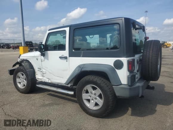 ✅ 2018 Jeep Wrangler Sport S • VIN: 1C4AJWAG1JL931316 • Lot: 82139355. Listed on Copart with 85,042 mi. Free auction sales archive from the USA and detailed vehicle history report at DreamBid. Image 2.