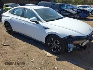 ✅ 2025 Hyundai Sonata SEL • VIN: KMHL64JA1SA430218 • Лот: 43622988. Опубликован ранее на IAAI с пробегом 20 972 миль. Бесплатный доступ к архиву аукционных продаж из США и подробный отчёт об истории автомобиля на DreamBid. Изображение 1.