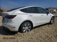 ✅ 2024 Tesla Model Y Long Range • VIN: 7SAYGDEE5RF066748 • Lot: 71739845. Listed on Copart with 20,504 mi. Free auction sales archive from the USA and detailed vehicle history report at DreamBid. Image 3.