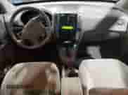 2005 Hyundai Tucson GLS z VIN KM8JN72D15U141766, wystawiony jako Copart lot #80990424 z przebiegiem 158 819 mil mil oraz Szkoda całkowita • Salvage title. Historia ofert i sprzedaży dostępna na DreamBid. Obrazek 8.