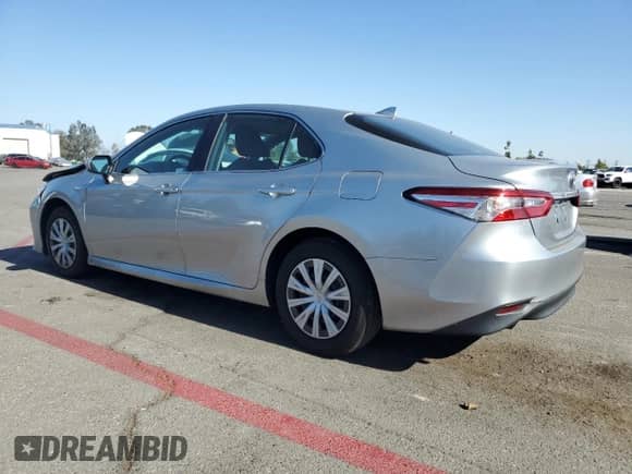 2020 Toyota Camry Hybrid LE with VIN 4T1C31AK9LU017687, listed as a Copart auction lot 82233015 with 45,526 mi miles and Salvage title. Bid and sale history available at DreamBid. Image 2.