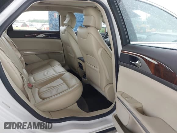 ✅ 2014 Lincoln MKZ Hybrid • VIN: 3LN6L2LU2ER817257 • Lot: 43149857. Listed on IAAI with 117,590 mi. Free auction sales archive from the USA and detailed vehicle history report at DreamBid. Image 8.