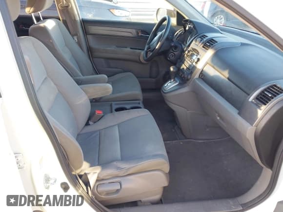 ✅ 2007 Honda CR-V EX • VIN: JHLRE38597C056136 • Lot: 43660143. Listed on IAAI with 185,292 mi. Free auction sales archive from the USA and detailed vehicle history report at DreamBid. Image 5.