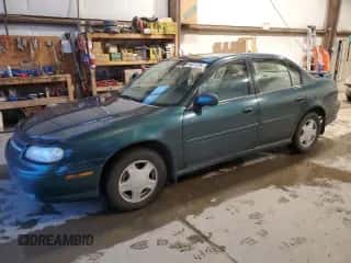 2000 Chevrolet Malibu LS z VIN 1G1NE52J9Y6223472, wystawiony jako Copart lot #84031724 z przebiegiem 230 453 mil mil oraz Czysty tytuł • Clean title. Historia ofert i sprzedaży dostępna na DreamBid. Obrazek 1.
