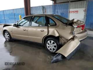 2001 Saturn LS z VIN 1G8JU52F71Y556133, wystawiony jako Copart lot #74704314 z przebiegiem 199 915 mil mil oraz Szkoda całkowita • Salvage title. Historia ofert i sprzedaży dostępna na DreamBid. Obrazek 2.