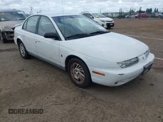 ✅ 1999 Saturn SL • VIN: 1G8ZK5279XZ290439 • Lot: 41899736. Wystawiony na IAAI z przebiegiem 154 348 mil. Bezpłatny archiwum sprzedaży aukcyjnych z USA i szczegółowy raport historii pojazdu na DreamBid. Zdjęcie 1.