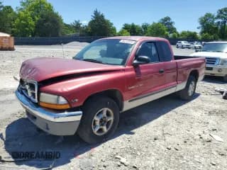 ✅ 1998 Dodge Dakota SLT • VIN: 1B7GL22X7WS660755 • Lot: 58212324. Wystawiony na Copart z przebiegiem 266 469 mil. Bezpłatny archiwum sprzedaży aukcyjnych z USA i szczegółowy raport historii pojazdu na DreamBid. Zdjęcie 1.