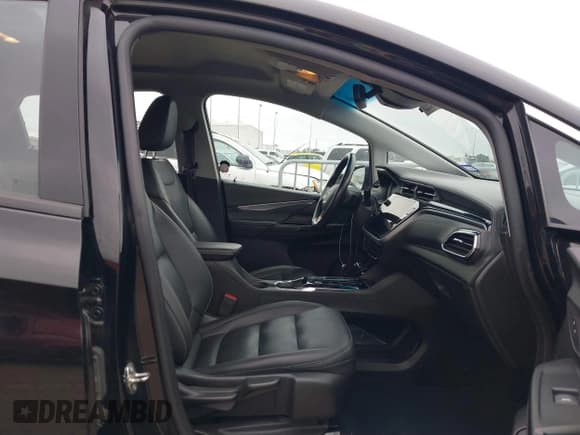 ✅ 2023 Chevrolet Bolt EV 2LT • VIN: 1G1FX6S02P4143467 • Lot: 41607322. Wystawiony na IAAI z przebiegiem 95 398 mil. Bezpłatny archiwum sprzedaży aukcyjnych z USA i szczegółowy raport historii pojazdu na DreamBid. Zdjęcie 5.