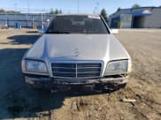 ✅ 2000 Mercedes-Benz C 230 Kompressor • VIN: WDBHA24G5YF935573 • Лот: 76331604. Опубликован ранее на Copart с пробегом 261 917 миль. Бесплатный доступ к архиву аукционных продаж из США и подробный отчёт об истории автомобиля на DreamBid. Изображение 5.