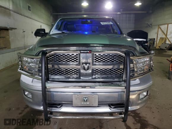 ✅ 2009 Dodge 1500 Laramie • VIN: 1D3HV13T39J530042 • Lot: 41770485. Wystawiony na Copart z przebiegiem 128 856 mil. Bezpłatny archiwum sprzedaży aukcyjnych z USA i szczegółowy raport historii pojazdu na DreamBid. Zdjęcie 5.