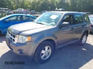 ✅ 2010 Ford Escape XLS • VIN: 1FMCU9C76AKD41290 • Lot: 43277599. Listed on IAAI with 124,053 mi. Free auction sales archive from the USA and detailed vehicle history report at DreamBid. Image 2.