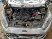 ✅ 2014 Ford Fiesta S • VIN: 3FADP4TJ3EM110981 • Lot: 95124375. Wystawiony na Copart z przebiegiem 113 718 mil. Bezpłatny archiwum sprzedaży aukcyjnych z USA i szczegółowy raport historii pojazdu na DreamBid. Zdjęcie 11.