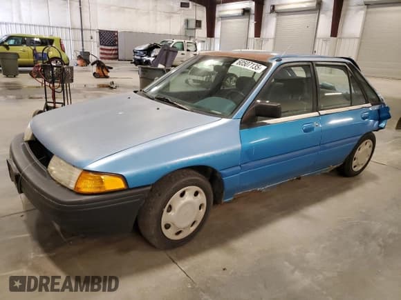 ✅ 1994 Ford Escort • VIN: 1FARP14J9RW318226 • Lot: 60507135. Listed on Copart with 69,041 mi. Free auction sales archive from the USA and detailed vehicle history report at DreamBid. Image 1.