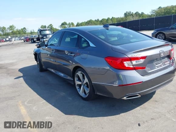 ✅ 2019 Honda Accord Touring • VIN: 1HGCV2F92KA028056 • Lot: 43168173. Listed on IAAI with 100,972 mi. Free auction sales archive from the USA and detailed vehicle history report at DreamBid. Image 3.