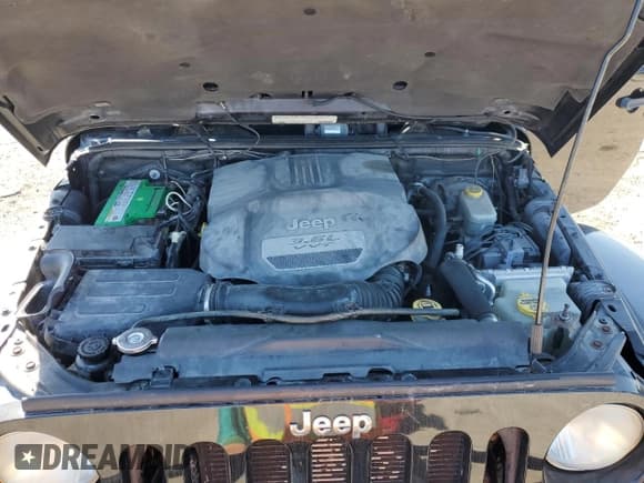 ✅ 2012 Jeep Wrangler Sahara • VIN: 1C4AJWBG1CL216425 • Lot: 48377825. Wystawiony na Copart z przebiegiem 99 649 mil. Bezpłatny archiwum sprzedaży aukcyjnych z USA i szczegółowy raport historii pojazdu na DreamBid. Zdjęcie 11.