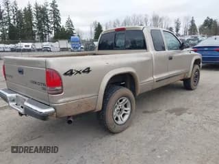 ✅ 2004 Dodge Dakota SLT • VIN: 1D7HG42N44S525545 • Lot: 41739083. Wystawiony na IAAI z przebiegiem 266 353 mil. Bezpłatny archiwum sprzedaży aukcyjnych z USA i szczegółowy raport historii pojazdu na DreamBid. Zdjęcie 4.