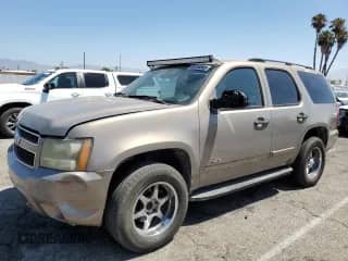2007 Chevrolet Tahoe LS z VIN 1GNFC13JX7R230251, wystawiony jako Copart lot #65454845 z przebiegiem 176 339 mil mil oraz Czysty tytuł • Clean title. Historia ofert i sprzedaży dostępna na DreamBid. Obrazek 1.