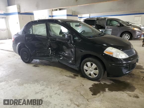 ✅ 2009 Nissan Versa 1.6 • VIN: 3N1CC11E39L455285 • Lot: 81408475. Listed on Copart with 98,900 mi. Free auction sales archive from the USA and detailed vehicle history report at DreamBid. Image 4.