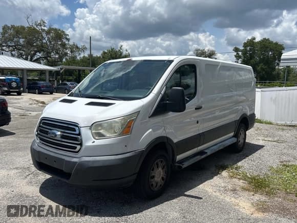 ✅ 2015 Ford Transit Cargo • VIN: 1FTNR1ZM6FKA47229 • Lot: 61978315. Listed on Copart with 227,678 mi. Free auction sales archive from the USA and detailed vehicle history report at DreamBid. Image 2.