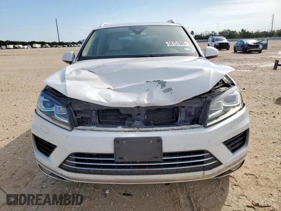 ✅ 2017 Volkswagen Touareg Sport • VIN: WVGEF7BP6HD003878 • Лот: 58151085. Опубликован ранее на Copart с пробегом 101 461 миль. Бесплатный доступ к архиву аукционных продаж из США и подробный отчёт об истории автомобиля на DreamBid. Изображение 5.