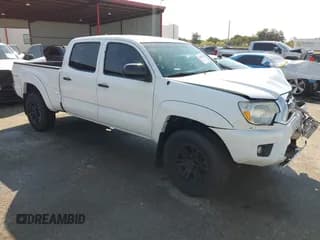 ✅ 2015 Toyota Tacoma PreRunner • VIN: 5TFKU4HN6FX006874 • Lot: 43090148. Listed on IAAI with 182,527 mi. Free auction sales archive from the USA and detailed vehicle history report at DreamBid. Image 1.