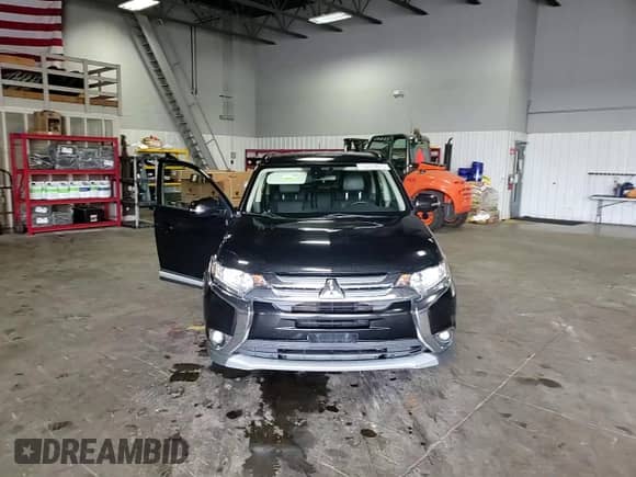 2016 Mitsubishi Outlander SE с VIN JA4AZ3A33GZ057264, выставлен на аукционе Copart как лот 69369875 с пробегом 162 081 миль миль и Списание • Salvage title. История ставок и продаж доступна на DreamBid. Изображение 14.