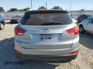 2014 Hyundai Tucson SE z VIN KM8JU3AG0EU904822, wystawiony jako Copart lot #62285174 z przebiegiem 104 496 mil mil oraz Szkoda całkowita • Salvage title. Historia ofert i sprzedaży dostępna na DreamBid. Obrazek 6.