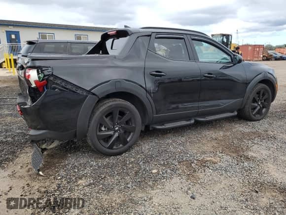 2023 Hyundai Santa Cruz Night Edition с VIN 5NTJCDAF1PH063905, выставлен на аукционе Copart как лот 81644144 с пробегом 20 707 миль миль и Списание • Salvage title. История ставок и продаж доступна на DreamBid. Изображение 3.