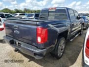 ✅ 2018 Chevrolet Silverado 1500 LTZ • VIN: 3GCUKSECXJG406276 • Лот: 74538784. Опубликован ранее на Copart с пробегом 97 927 миль. Бесплатный доступ к архиву аукционных продаж из США и подробный отчёт об истории автомобиля на DreamBid. Изображение 3.