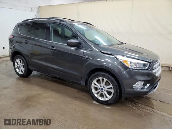 ✅ 2018 Ford Escape SE • VIN: 1FMCU9GD3JUA90992 • Lot: 57409845. Wystawiony na Copart z przebiegiem 112 658 mil. Bezpłatny archiwum sprzedaży aukcyjnych z USA i szczegółowy raport historii pojazdu na DreamBid. Zdjęcie 4.