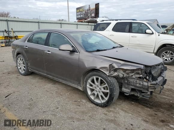 ✅ 2012 Chevrolet Malibu LTZ • VIN: 1G1ZE5EU7CF157570 • Lot: 82427004. Listed on Copart with 152,932 mi. Free auction sales archive from the USA and detailed vehicle history report at DreamBid. Image 4.
