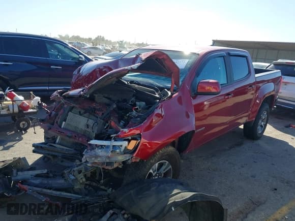 ✅ 2020 Chevrolet Colorado 4WD Z71 • VIN: 1GCGTDEN5L1205667 • Lot: 43642173. Listed on IAAI with 88,739 mi. Free auction sales archive from the USA and detailed vehicle history report at DreamBid. Image 2.
