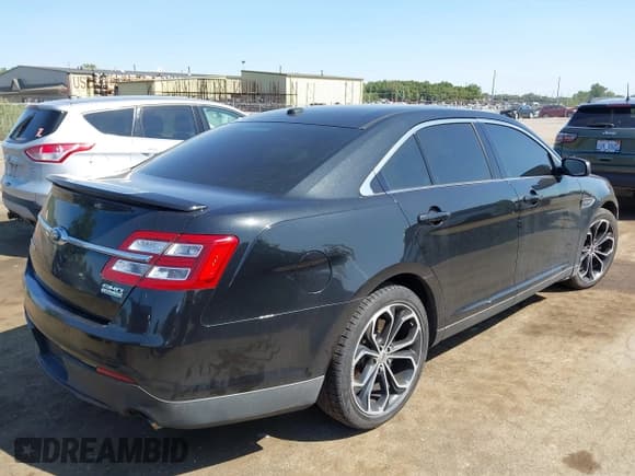 ✅ 2013 Ford Taurus SHO • VIN: 1FAHP2KT5DG116265 • Lot: 43182852. Listed on IAAI with 157,673 mi. Free auction sales archive from the USA and detailed vehicle history report at DreamBid. Image 4.