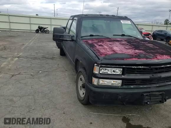 1997 Chevrolet Silverado 3500 with VIN 1GCHC33J3VF052789, listed as a Copart auction lot 86842835 with 137,985 mi miles and Salvage title. Bid and sale history available at DreamBid. Image 14.