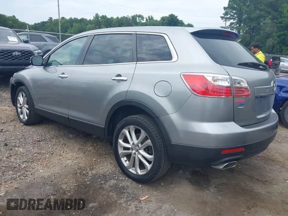✅ 2012 Mazda CX-9 Grand Touring • VIN: JM3TB2DA1C0345779 • Lot: 42458552. Wystawiony na IAAI z przebiegiem 215 126 mil. Bezpłatny archiwum sprzedaży aukcyjnych z USA i szczegółowy raport historii pojazdu na DreamBid. Zdjęcie 3.