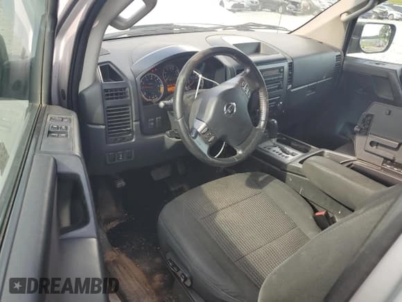 ✅ 2012 Nissan Titan SE • VIN: 1N6AA0CC8CN301840 • Lot: 61038265. Listed on Copart with 166,745 mi. Free auction sales archive from the USA and detailed vehicle history report at DreamBid. Image 8.