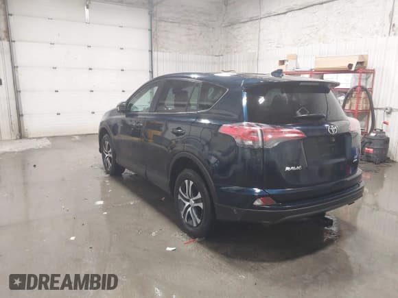 ✅ 2018 Toyota RAV4 LE • VIN: 2T3BFREV6JW767297 • Lot: 43736278. Listed on IAAI with 99,323 mi. Free auction sales archive from the USA and detailed vehicle history report at DreamBid. Image 3.