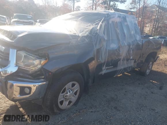 ✅ 2014 Toyota Tundra SR5 • VIN: 5TFRM5F12EX069974 • Lot: 41752200. Listed on IAAI with 15 mi. Free auction sales archive from the USA and detailed vehicle history report at DreamBid. Image 6.