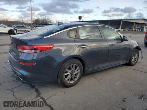 ✅ 2019 Kia Optima S • VIN: 5XXGT4L38KG377387 • Лот: 90328595. Опубликован ранее на Copart с пробегом 92 338 миль. Бесплатный доступ к архиву аукционных продаж из США и подробный отчёт об истории автомобиля на DreamBid. Изображение 3.