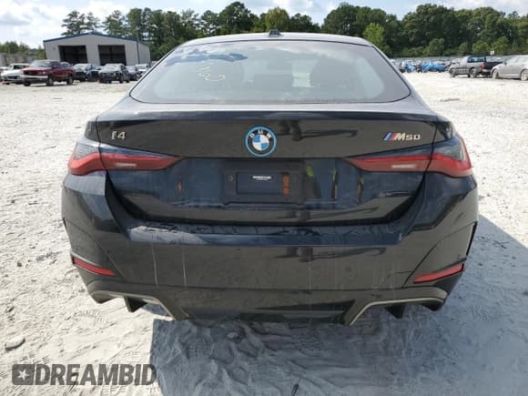 ✅ 2022 BMW i4 M50 • VIN: WBY33AW04NFM42395 • Lot: 69838203. Wystawiony na Copart z przebiegiem 12 666 mil. Bezpłatny archiwum sprzedaży aukcyjnych z USA i szczegółowy raport historii pojazdu na DreamBid. Zdjęcie 6.