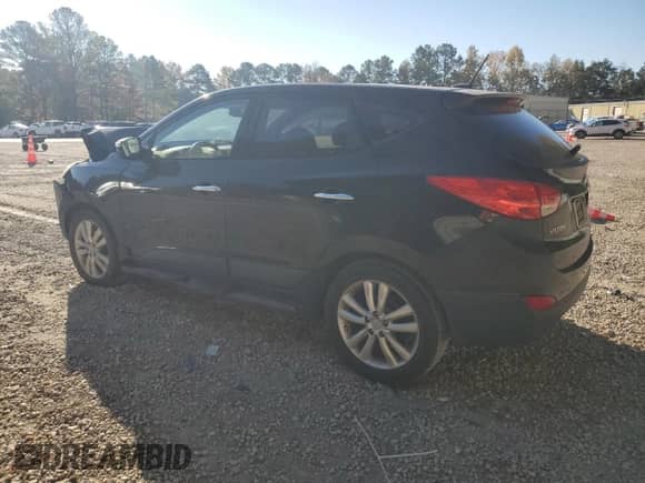 2011 Hyundai Tucson GLS z VIN KM8JU3AC0BU142391, wystawiony jako Copart lot #77628954 z przebiegiem 117 081 mil mil oraz Szkoda całkowita • Salvage title. Historia ofert i sprzedaży dostępna na DreamBid. Obrazek 2.