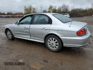 ✅ 2005 Hyundai Sonata GLS • VIN: KMHWF35H65A107771 • Лот: 79706584. Опубликован ранее на Copart с пробегом 148 601 миль. Бесплатный доступ к архиву аукционных продаж из США и подробный отчёт об истории автомобиля на DreamBid. Изображение 2.