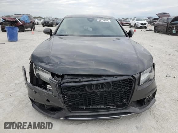 ✅ 2013 Audi S7 Prestige • VIN: WAU32AFCXDN087023 • Lot: 88739005. Wystawiony na Copart z przebiegiem 81 261 mil. Bezpłatny archiwum sprzedaży aukcyjnych z USA i szczegółowy raport historii pojazdu na DreamBid. Zdjęcie 5.