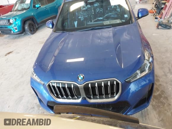 ✅ 2023 BMW X1 xDrive28i • VIN: WBX73EF00P5W58167 • Lot: 42930953. Listed on IAAI with 34,505 mi. Free auction sales archive from the USA and detailed vehicle history report at DreamBid. Image 11.